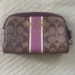 Authentic coach mini bag. Good for make up brushes etc.